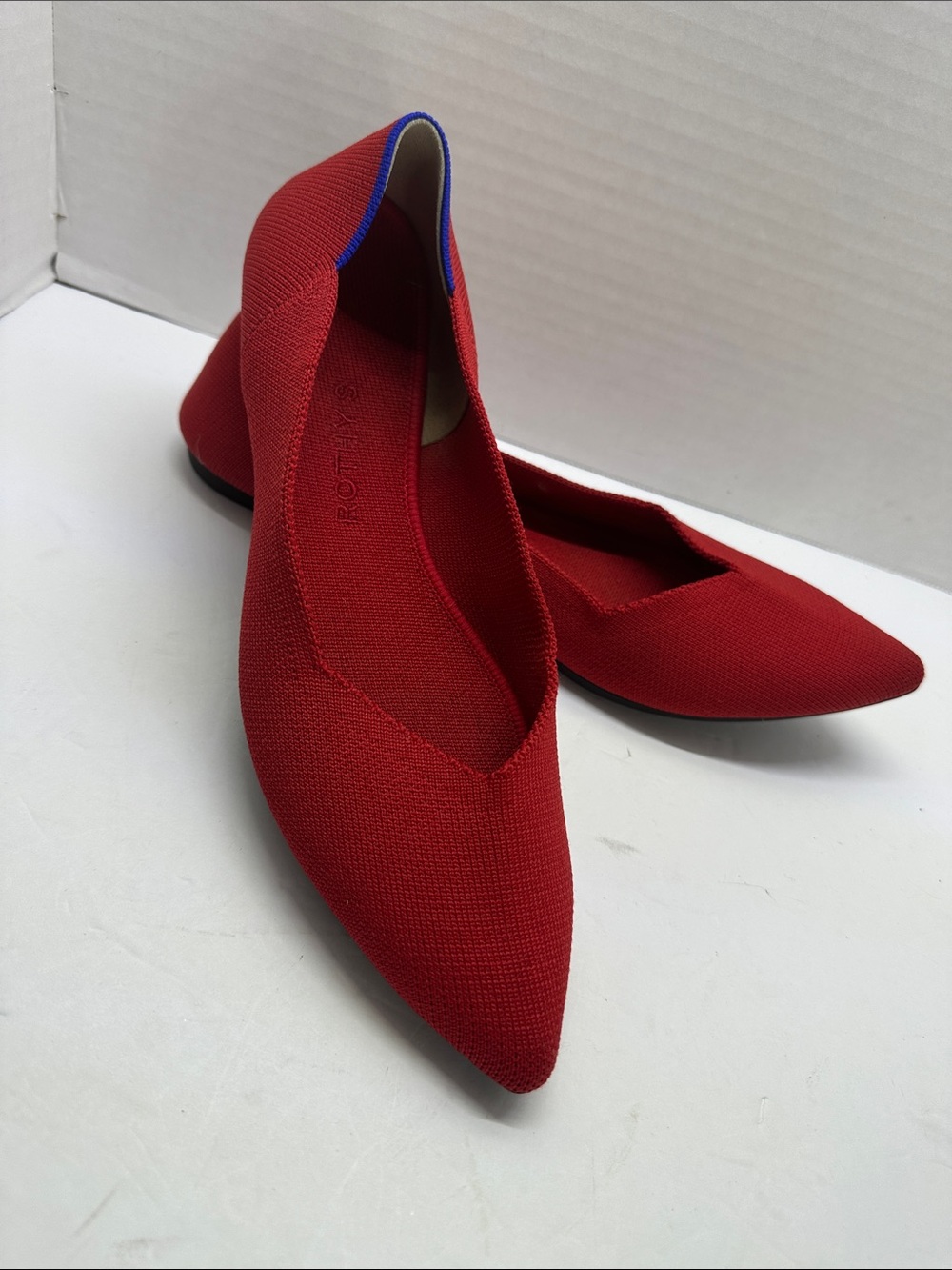 Rothy's Red Pointed Knit Flats with Blue Heel Trim